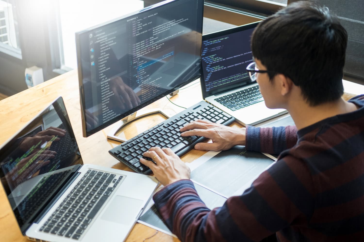 Component-based development, CI for content and code, environments and approvals, security and performance checks before go-live.